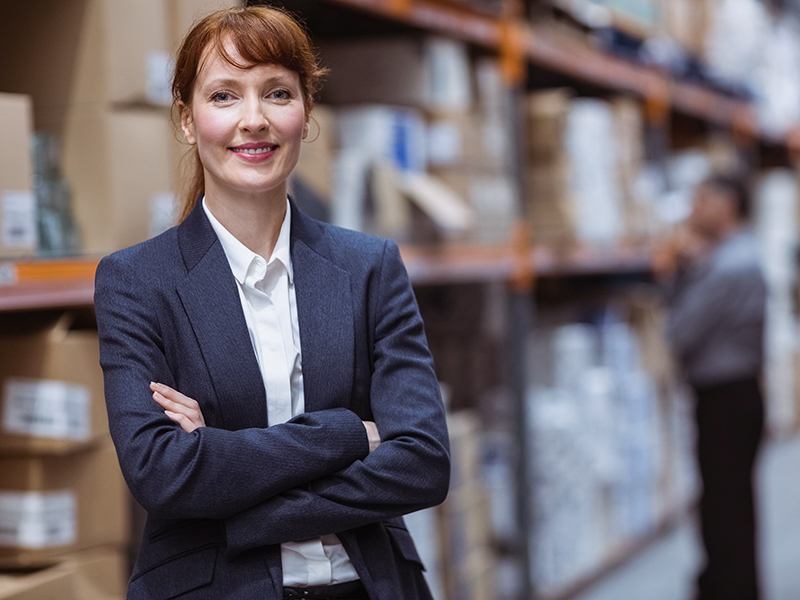 Female manager with arms crossed